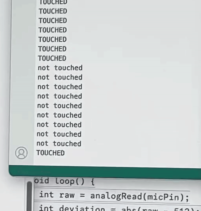 Arduino's readings of a TOUCHED vs NOT TOUCHED state on the serial monitor.